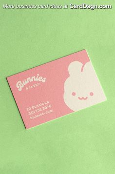 a business card with an image of a bunny on it