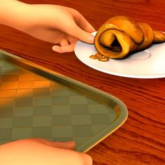 a person holding a piece of bread on top of a white plate next to a wooden table