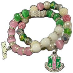 Friendship Green Jewelry With Charms, Green Charms Jewelry For Friendship, Green Charm Bracelet With Colorful Beads As Gift, Green Bracelets With Charms And Round Beads, Aka Apparel, Green Bracelet, Nov 2, Pink Girl, Pink And Green