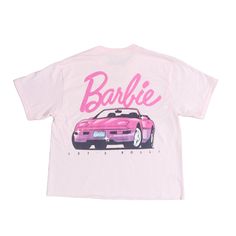 Features: Raw Trim For A Lived-In Look, Classic Barbie Logo To Front And Back Of Shirt Material: 100% Cotton Length: 20 1/2” Pink Graphic Print Cropped T-shirt For Streetwear, Pink Graphic Tee Cropped T-shirt With Text Print, Pink Cropped T-shirt With Graphic Print For Streetwear, 90s Pink Logo Print Tops, Pink 90s Logo Print Tops, 90s Pink Tops With Logo Print, 90s Style Pink Tops With Logo Print, Pink Barbie Logo, Barbie Print