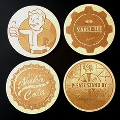 four coasters with different types of beer logos on them, all in gold and white