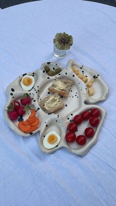 an assortment of food is displayed on a plate