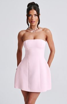 Simple and seriously chic. the Asha mini is this season's obsession. Perfect to wear for date nights. late nights and beyond. this strapless design is finished with seam details and a bubble shape skirt for extra volume.  Colour: Blush. Premium non-stretch crepe. Fully lined. Strapless. Hugs the figure. Seam details. Bubble shape skirt. Invisible zip fastening. Mini length. Model is an XS and is wearing an XS. Homecoming Dresses Corset, Midi Dress Wedding Guest, Maxi Dress Sale, Sparkle Dress, Date Nights, Grad Dresses, Stretch Crepe, Dresses By Length, Invisible Zip