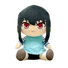 a stuffed animal with red eyes and black hair