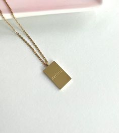 Show your affection to her with our Darling Necklace. Don’t forget to pair it with any of our other necklaces for the one of a kind look 💕 Made to last! Tarnish and Water Resistant & Hypoallergenic 16 inches + 2 Inches ext Pendant .50 inch x .75incg 18k Gold Plated over 316L Stainless Steel base. Meaningful Gold Necklaces As Gift For Her, Meaningful Rectangular Necklaces For Gifts, Meaningful Rectangular Necklace For Gift, Meaningful Gift Necklace, Minimalist 16 Inch Charm Necklace As Gift, Meaningful Gold Necklace As Gift For Her, Small Minimalist Necklace Perfect For Gifts, Small Minimalist Necklace For Gift, Small Hypoallergenic Necklace For Gift