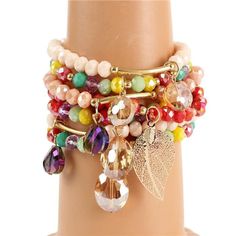 This multi color crystal leaf charm bracelet set is a perfect match to any outfit and jewelry collection. Multicolor Crystal Bracelet, Elephant Charm Bracelet, Wire Bracelets, Memory Wire Bracelets, Elephant Charm, Leaf Charms, Memory Wire, Wire Bracelet, Crystal Charm