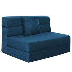 a blue couch with two pillows on the back and one arm folded over it's head