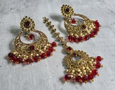 We are thrilled to introduce our exquisite collection of Indian earrings in Maroon color. These stunning earrings are crafted to enhance your style, whether you're attending a party or a wedding ceremony. They are guaranteed to make you stand out in the crowd.Elevate your style with these stunning Earrings. Make a bold fashion statement and turn heads wherever you go. Shop our stunning collection today!We have a wide range of colors available, so be sure to check our other listings to find the perfect match for your style. In addition to this earring, we have a wide variety of Indian Pakistani jewelry. Explore our shop to discover the perfect piece for your collection. If you're having trouble viewing our photos, try increasing your screen brightness for a clearer image.We aim to dispatch Elegant Plug Earrings For Festive Celebration, Elegant Festive Celebration Plug Earrings, Traditional Red Gold-plated Bridal Earrings, Traditional Crystal Earrings For Festive Occasions, Elegant Chandbali Beaded Earrings For Festivals, Elegant Metal Chandbali Bridal Earrings, Elegant Plug Earrings For Festival Celebrations, Elegant Chandbali Bridal Earrings In Metal, Elegant Drop Beaded Earrings For Festivals