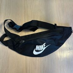 Nike Black Bag Can Be Worn As A Fanny Pack Or Cross Body Adjustable Strap With Buckle 2 Zipper Pockets Never Used, In Perfect Condition No Wears Or Tears Casual Mobile Phone Bag For Streetwear, Casual Pouch Bag For Streetwear, Casual Streetwear Pouch Bag, Nike Black Bags For Everyday, Black Nike Bag With Adjustable Strap, Nike Black Everyday Bags, Everyday Black Nike Bag, Nike Black Bag With Zipper Closure, Nike Black Shoulder Bag For Travel