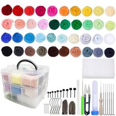 an assortment of crafting supplies including scissors, thread, and other items in plastic containers