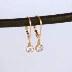 14k Gold Filled Modern Hoop Dangling Disc/Coin Earrings. This beautiful Earrings match with any outfit and comfortable wearing everyday. ★★Choose hoop style from drop down box . see picture no: #2. Then beautiful Earrings consists of -14k gold fill lever back Earrings. -6mm 14k gold fill bezel setting CZ dot necklace , -Come up with ribbon gift box and -One set of Care instruction package. MORE EARRINGS https://www.etsy.com/shop/rainbowearring1?section_id=22425645 Disc / Coin Necklace https://ww Gold Drop Earrings With Prong Setting, Hypoallergenic 14k Gold Diamond White Jewelry, Gold Tarnish Resistant Round Cut Earrings, Gold Tarnish-resistant Round Cut Earrings, Gold Tarnish-resistant Round-cut Earrings, 14k Gold Diamond Earrings With Ear Wire As Gift, Gold Drop Diamond Earrings With Prong Setting, Gold Plated Dangle Earrings With Prong Setting, Gold Plated Round Diamond Earrings As Gift