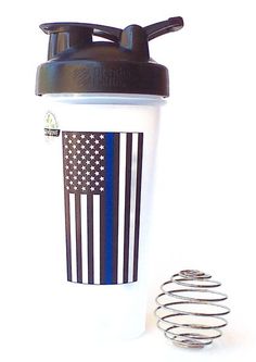 a shaker cup with an american flag on the side and spirals around it