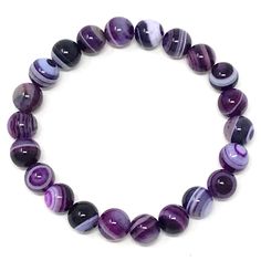 Precious looking black onyx & purple striped agate gemstones bracelets with a platinum plated purple bead• elegant, simple and meaningful! Black Onyx absorbs and transforms negative energy, and helps to prevent the drain of personal energy. Black Onyx aids the development of emotional and physical strength and stamina, especially when support is needed during times of stress, confusion or grief. The 2 piece set includes: 1x 8mm black onyx bracelet 1x 8mm purple striped agate bracelet ** the Purple Agate Bracelets, Adjustable Purple Agate Beaded Bracelets, Purple Agate Beaded Bracelets As A Gift, Purple Agate Round Beaded Jewelry, Purple Agate Round Bead Jewelry, Purple Agate Round Beads Jewelry, Purple Bracelets With 8mm Round Beads, Purple Agate Gemstone Beads Bracelets, Purple Agate Bracelets With Natural Stones