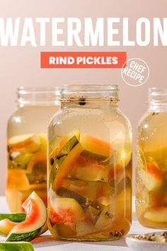 three jars filled with pickles and watermelon slices