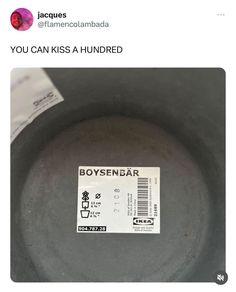 an empty frying pan with a sticker on it that says, you can kiss a hundred