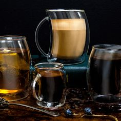 there are three different types of coffees in glass mugs next to each other