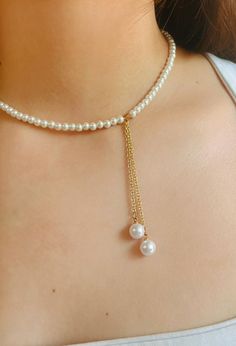 Discover the timeless elegance of our Handmade 16"  faux pearl necklace. Crafted with precision and care, each bead captures the classic beauty of pearls, creating a stunning accessory that adds a touch of sophistication to any outfit. Perfect for both casual and formal occasions, this necklace is a must-have for anyone who appreciates fine craftsmanship and style. Cheap Elegant Beaded Necklaces, Cheap Elegant Beaded Necklaces As Gifts, Cheap Beaded Formal Jewelry, Elegant Cheap Necklaces With Dangling Beads, Cheap Elegant Beaded Chain Jewelry, Cheap Elegant Beaded Necklaces For Parties, Cheap Beaded Jewelry For Formal Occasions, Cheap Elegant Beaded Necklace, Cheap Elegant Necklace With Spacer Beads