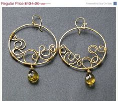 ON SALE Nouveau 171 Hammered Squiggle Hoops by CalicoJunoJewelry, $120.60 Modern Wire Wrapped Hoop Earrings For Gift, Modern Gold Wire Wrapped Hoop Earrings, Gold Swirl Earrings With Ear Wire, Gold Swirl Handmade Jewelry, Gold Handmade Swirl Jewelry, Artisan Brass Hoop Earrings Wire Wrapped, Swirl-shaped Earrings With Ear Wire, Wire Wrapped Jewelry Tutorials, Jewelry Tutorials