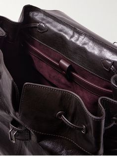 Métier's 'Glide' backpack is such a sleek way to carry the essentials, whether you're headed to the office or airport. Handcrafted in Italy from panels of glossy full-grain leather, it's stamped with the label's logo and can be carried by the sturdy top handle or adjustable shoulder straps. It has a laptop sleeve along with plenty of pockets to keep your keys, phone and wallet organised. Leather Backpack For Men, Summer Sunglasses, Wallet Organization, Fine Jewelry Designers, Luxury Gifts, Mr Porter, Luxury Watch, Laptop Sleeve, Full Grain Leather