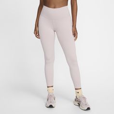 Up for a workout or down to chill, these leggings are the Ones that are ready for whatever you are. Their midweight, peachy-soft fabric stretches with your every move and dries quickly. Plus, a high waist is designed to meet your favorite cropped tops for a head-to-toe look that you can feel confident and comfortable in all day long. Nike Functional Yoga Bottoms, Nike High Stretch Bottoms For Pilates, Nike Yoga Pants With 4-way Stretch, Tight Nike Moisture-wicking Activewear, Nike Stretch Yoga Pants, Nike Stretch Yoga Pants For Pilates, Nike Tight Moisture-wicking Activewear, Nike 4-way Stretch Yoga Pants, Nike Yoga Pants With 4-way Stretch In Athleisure Style