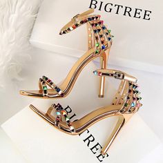 Brand Name: BIGTREEHeel Height: Super High (8cm-up)With Platforms: NoSandal Type: Modern SandalsOrigin: CN(Origin)Occasion: PartyUpper Material: PUOutsole Material: RubberBack Counter Type: Back StrapPattern Type: Mixed ColorsSide Vamp Type: OpenFit: Fits true to size, take your normal sizeStyle: sexyHeel Type: Thin HeelsLining Material: PUClosure Type: Buckle StrapModel Number: 267-2Item Type: SandalsFashion Element: RivetInsole Material: PUDepartment Name: Adult Hak Tinggi, Sandals Patterns, Roman Style, Modern Sandals, Gladiator Heels, Roman Fashion, Studded Sandals, Stiletto Sandals, Shoe Show