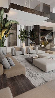 a large living room with couches and plants in it