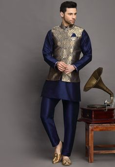 Art Silk Kurta in Navy BlueThis Readymade attire is Enhanced with Buttons. Crafted in Chinese Collar Neck and Full SleeveAvailable with an Art Silk Pajama in Navy Blue and an Art Brocade Silk Nehru Jacket in Navy BlueDo note: Brooch and Footwear shown in the image is for presentation purposes only. Half to one inch may vary in measurement. (Slight variation in actual color vs. image is possible)  We sell all kinds of menswear. Mens Kurta | Mens Kurta Pajama | Mens Sherwani | Mens Sherwani Sets | Cultural Outfits, Mens Kurta Pajama, Indian Jackets, Mens Indian Wear, Vs Image, Mens Sherwani, Kurta Patterns, Kurta Men, Mens Kurta