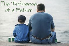 a father and son sitting on the dock watching the water