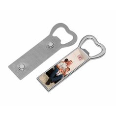 a bottle opener with a photo attached to it