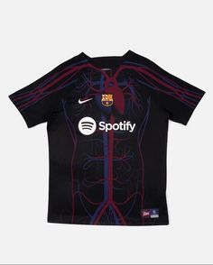 the back of a soccer jersey that says spotify with an image of muscles on it