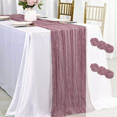 the table is set with an elegant purple runner