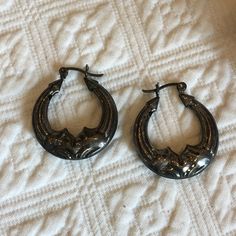 "Vintage Silver Plate Animal Type Hoop Earrings. Ridged Hoop Designs. Need to be polished. Earrings in Good Shape but tarnished. Will polish up nicely. Size:  1 1/8\" X 1 1/4\" For other vintage jewelry and other items see:  www.VeryVictorianStudio.etsy.com. For sewing related items see my other shop: www.SewingRoomStore.etsy.com. Thank you for looking!" Grunge Hoop Earrings, Cadmium-free Silver Hoop Earrings, Hinged Hoop Metal Jewelry, Shiny Metal Hoop Jewelry, Small Hoop Metal Earrings With Shiny Finish, Vintage Hoop Metal Jewelry, Vintage Small Hoop Metal Earrings, Vintage Metal Hoop Jewelry, Silver Metal Pierced Hoop Earrings