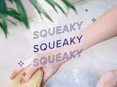 a woman is cleaning the floor with a sponge on her hand and words that spell out squeaky, squeaky, sqeaky