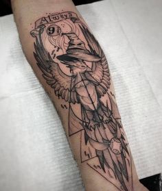 a bird with an arrow on it's arm is shown in black and white