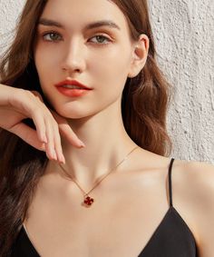 ✧ Material: 24K Yellow Gold Filled | 925 Sterling Silver ✧ Stone: Agate + Diamond Simulant Adorn yourself with the exquisite beauty of our 24K Gold Red Agate Clover Necklace, where sophistication meets natural allure in a stunning piece of jewelry. Meticulously handcrafted, this necklace is a true symbol of refined craftsmanship and timeless elegance. Craftsmanship and Materials: Each necklace is meticulously crafted with a solid layer of 24K gold over a 925 sterling silver base, ensuring durabi Luxury Red Chain Jewelry, Red Round Pendant Necklace In Fine Jewelry, Red Round Pendant Necklace Fine Jewelry, Red Gemstone Necklace For Her, Red Gemstone Jewelry As Gift For Her, Red Gemstone Necklace As A Gift For Her, Red Gemstone Jewelry Gift For Her, Luxury Red Heart Pendant Necklaces, Ruby Clavicle Chain Jewelry As Gift