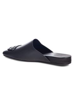 These black Balenciaga BB logo leather slipper shoes feature a square toe, slip-on design, flat sole and BB logo plaque.Calfskin leather with leather soleRubber tap heelMatte black-tone BB logo detail Composition: Leather 100%Lining Composition: Leather 100%Sole Composition: Leather 100% Fits true to sizeMade in Italy Flat Calf Leather Slip-ons With Leather Sole, Luxury Formal Slippers With Flat Heel, Calf Leather Slip-on Mules With Textured Sole, Elegant Calf Leather Slip-on Slippers, Elegant Slip-on Slippers In Calf Leather, Chic Formal Leather Slippers, Chic Leather Slippers For Formal Occasions, Elegant Black Leather Slippers, Flat Calf Leather Mules With Leather Sole