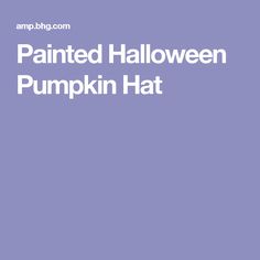 the words painted halloween pumpkin hat on a purple background