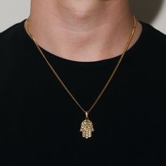 Our Gold Hamsa Pendant is made from Premium quality 316L stainless steel. This allows the pendant and chain to be water and sweat resistant. This chain can be worn on its own as a statement or be layered with other chains from our shop. -------------------------------------- ♛ DETAILS & MATERIALS ♛ -------------------------------------- ◈ Chain Length: 20.8 Inches ◈ Chain Width: 2.2 MM ◈ Chain Style: Curb chain ◈ Pendant Size: 25mm x 17mm x 1.9mm ◈ Chain Quality: 316L stainless steel with PVD vacuum 18K gold plating ◈ Chain Clasp: Lobster ◈ Model is male, 5'10 & size medium ◈ Hypoallergenic, water and sweat resistant Stainless Steel Pendant Necklaces With Curb Chain, Stainless Steel Pendant Necklace With Curb Chain, Necklace Man, Man Necklace, Gold Hamsa, Hamsa Pendant, Christmas Gifts For Him, Christmas Gifts For Men, Evil Eye Charm