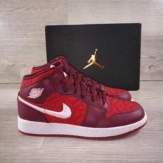 Elevate Your Sneaker Game With These Striking Nike Air Jordan 1 Mid Red Quilt Sneakers. They Come In A Youth Size 6y, Which Perfectly Fits Women's 7.5. These Kicks Boast A Unique Touch With An Embroidered Light Pink Swoosh, Adding A Subtle Yet Stylish Detail To Your Look. Brand New In The Original Box. Step Out In Style And Comfort With These Iconic Sneakers A Must-Have Addition To Your Collection. Don't Wait; Grab Them Now! #Nikejordan1 #Sneakergamestrong #Newinbox Sporty Burgundy High-top Sneakers, Burgundy Low-top Sneakers With Boost Midsole, Burgundy Lace-up Sneakers For Sports, Burgundy Lace-up Sports Sneakers, Red Leather Jordan Shoes, Red Leather Jordan Shoes With Laces, Burgundy Low-top Sneakers With Red Sole, University Red High-top Sneakers With Round Toe, Red Mid-top Jordan Shoes With Laces