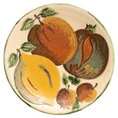 a plate with fruit painted on it