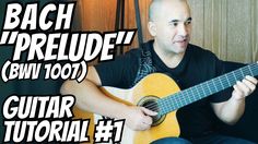 a man is playing an acoustic guitar with the words bach / prelude on it