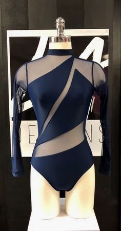 a woman's bodysuit on display in a store