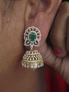 Grand 18 Karat Gold '4 in 1' Detachable Diamond Jhumkas - Diamond Dangle Earrings with Color Stones & Pearls
  Note: Only front side has Diamonds as shown in the picture, the back part of the Jhumka which is not visible from the front is only Gold without Diamonds 
  This product has Inter Changeable Red & Green color Stones in the Earrings 
    1. You can wear the earrings (ear tops) by itself 
  2. You can wear the ear tops with the middle layer only 
  3. You can wear the ear tops wit Diamond Jhumkas, Ear Tops, Color Stones, Diamond Dangle Earrings, Earrings Ear, Green Color, Green Colors, Red Green, Stone Color