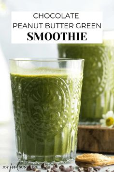 two glasses filled with green smoothie next to some cookies on the side and text overlay