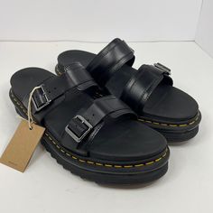 New Men’s Black Dr. Martens Myles Brando Leather Buckle Slide Sandals Size 12 Sturdy Ripple Sole Two Adjustable Buckle Straps Tough And Durable For Half Sizes Recommend To Go Down A Size Platform Height: 1 1/2 In; Heel Height: 1 7/8 In Brando Is A Full-Grain, Tough, And Durable Waxy Leather No Box Small Imperfections In Leather As Shown Black Leather Double Strap Slides, Black Closed Toe Slides With Buckle Closure, Black Leather Closed Toe Slides, Black Leather Double Strap Sandals, Dr Martens Myles, Doc Martens Sandals, Mens Slides Sandals, Black Leather Slides, Dr Martens Sandals