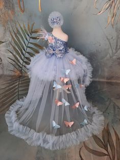 Blue Floral Applique Gown For Party, Blue Floral Applique Wedding Gown, Light Blue Tulle Dress With Floral Applique, Fitted Blue Tutu Dress For Wedding, Blue Floral Applique Wedding Dress, Ceremonial Tulle Dress With Detachable Train, Blue Wedding Dress With Floral Applique, Blue Tulle Dress With Floral Applique, Princess Gown With Floral Applique