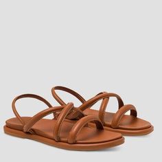 Whether you are on an island or just island time, the OluKai Tiare Strappy Sandal is a great friend. This strappy 100% leather slide is designed to be worn casually or dressed up so that your feet can feel good for tomorrows adventure. Leather Slip-on Sandals For Beach Season, Brown Slip-on Slingback Sandals For Beach, Brown Slingback Sandals For Beach Season, Strappy Sandals With Removable Insole For Vacation, Adjustable Strap Slip-on Footbed Sandals For Vacation, Leather Sandals With Single Toe Strap For Beach Season, Summer Beach Slingback Sandals With Braided Straps, Summer Beach Footbed Sandals With Strap, Summer Strappy Slingback Sandals For Beach