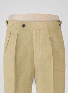 Need help with what to wear this wedding season? Look no further! Our Heavy Linen Khaki Trousers are designed to exude power with style. Spun from premium linen, you won't have to compromise on comfort when the temperature rises. With its neutral khaki tone and solid texture, these trousers are phenomenal and an absolute hoot. Whether you're the groom, a groomsman, or a guest, our trousers are guaranteed to make a statement and leave a lasting impression.   Look Includes   Heavy Linen Khaki Fab Classic Wedding Bottoms For Spring, Classic Spring Wedding Bottoms, Fitted Linen Bottoms For Semi-formal Occasions, Tailored Beige Linen Pants, Formal Linen Bottoms For Summer, Fitted Linen Pants With Flat Front, Formal Linen Summer Bottoms, Fitted Linen Flat Front Pants, Elegant Flat Front Summer Bottoms