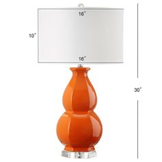 an orange table lamp with a white shade on the base and measurements for each bulb