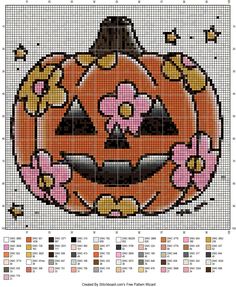 a cross stitch pattern with a pumpkin on it's face and flowers in the center